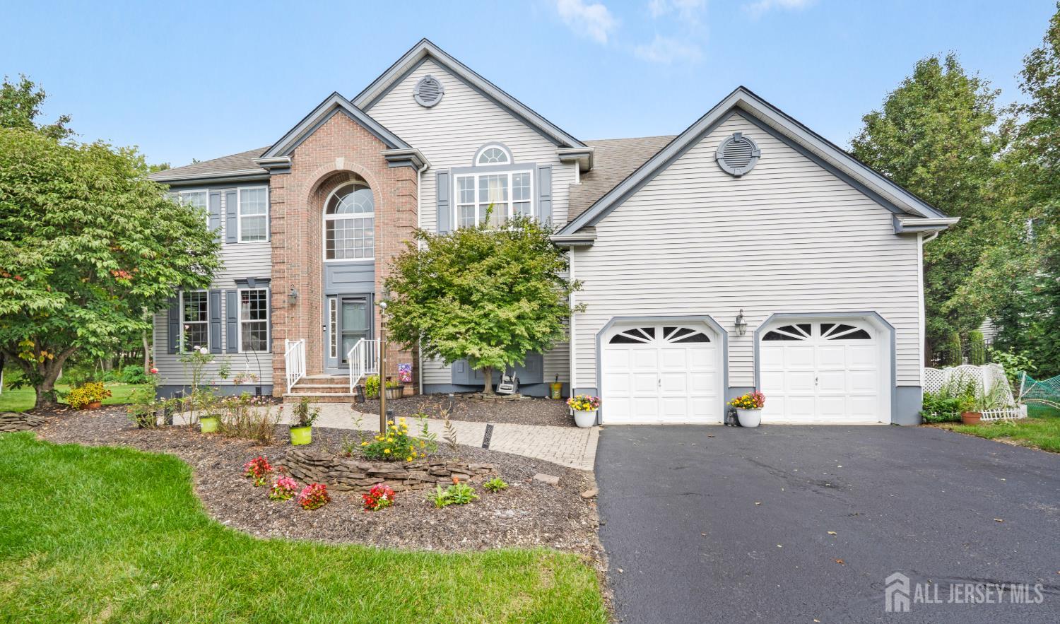 Front exterior and two-car garage at 74 Macfarlane Circle